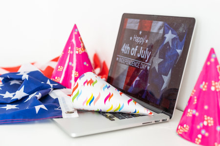 4th of July American Independence Day USA flags decorations with computerの写真素材