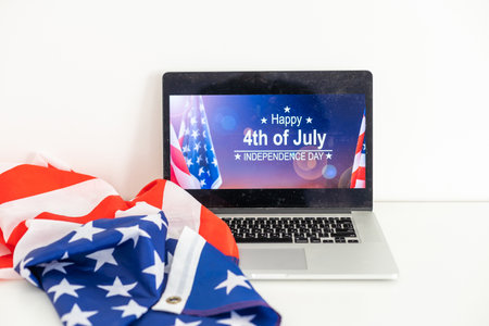 4th of July American Independence Day USA flags decorations with computerの写真素材