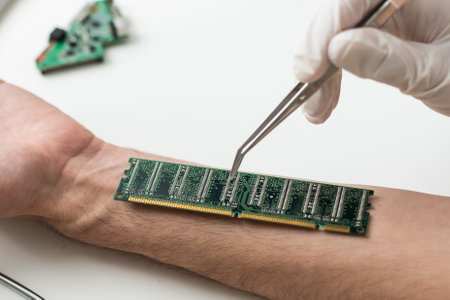 The man shows his hand with a chip implanted. The concept of chipping and implantation of electronic technologies into the human body. Cybernetics and the nanofutureの写真素材