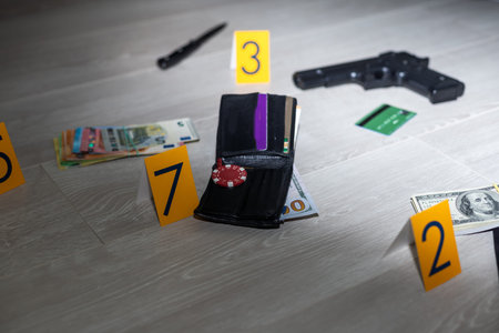 Evidence Chain of Custody Labels and brown paper bag with fingerprints applicant card lies against...