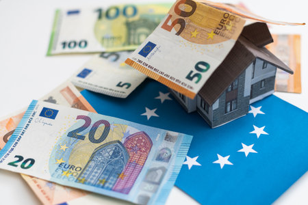 House laying on a 50 euros banknote. Concept of house and money.の写真素材