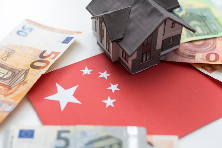 Small house on a flag - Living or migrating to Chinaの写真素材