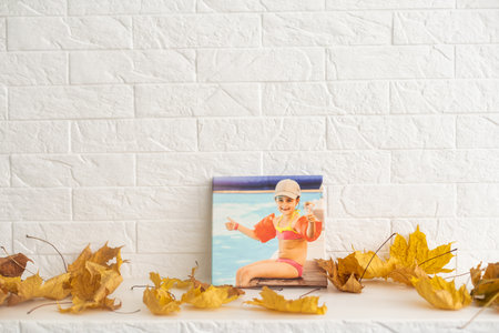 dry autumn leaves and photo canvasの写真素材