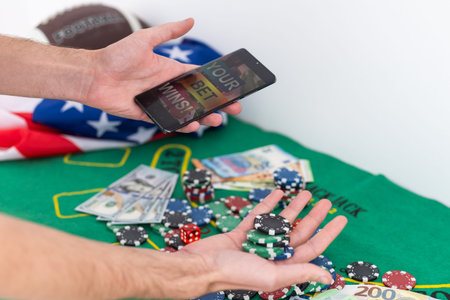 Gambling online casino Internet betting concept green screen. smartphone with poker chips, dice....