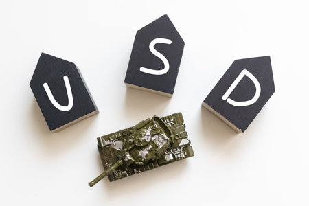 Word USD. Wooden small cubes with letters isolated on white background with copy space available.Business Concept image.の写真素材