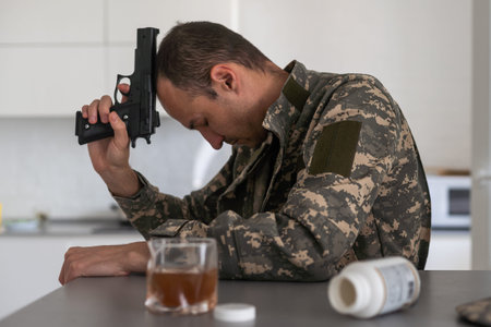 one man sit at home with bottle of liquor drink whiskey drunk alcoholic Alcohol abuse, addiction and...