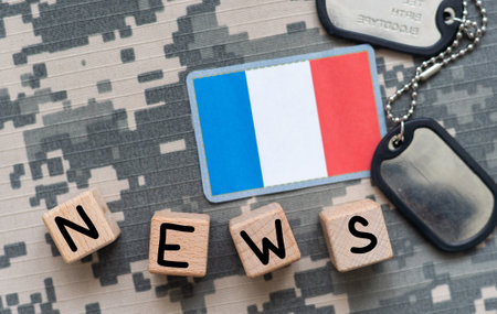 concept news feeds - Breaking news, French countrys flag, blackboard and the text Latest News on wooden backgroundの写真素材