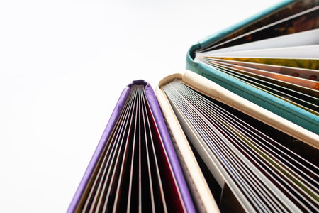 Background of multicolored old books close up. The concept of the book as a symbol of knowledgeの写真素材