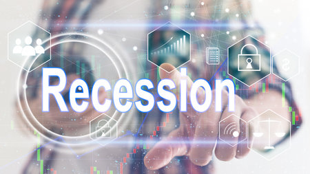 Double exposure hologram and with hands typing on laptop on background. Financial crisis and recession conceptの写真素材