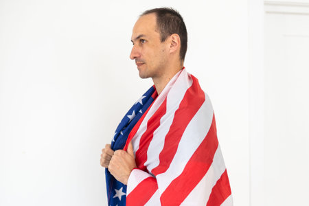 Man with USA flag on white background. Memorial Day celebration
