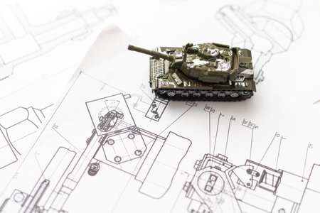 Military machine in the contour lines on graph paper. The contours of the black line on the white backgroundの写真素材