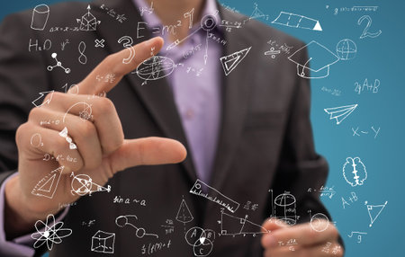 Businessman hand drawing glowing global business marketing plan. Trade and business analysis...