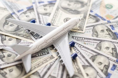 Airplane on Money, the rising costs of airline travel