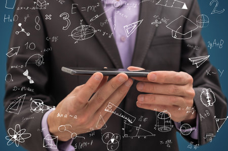 Businessman hand drawing glowing global business marketing plan. Trade and business analysis...