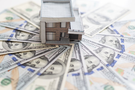 Miniature House and Money. Buying house conceptの写真素材