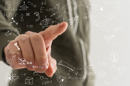 Businessman hand drawing glowing global business marketing plan. Trade and business analysis concept.の写真素材