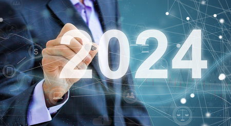 Business man touching screen with 2024 writingの写真素材
