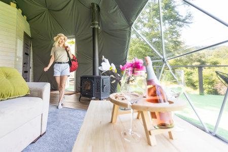 female tourist in transparent hotel domeの写真素材