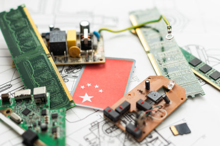 Electronic components on a schematic diagram background.の写真素材