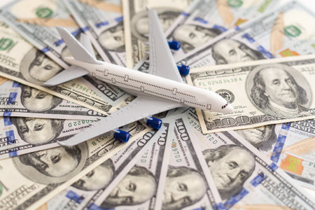 airplane on dollar bills close upの写真素材