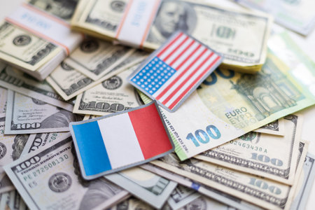 American Flag on a Bed of Dollar Bills.の写真素材