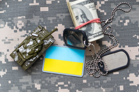 Military ID tags and patch on pixel Ukrainian camouflage, closeup no warの写真素材