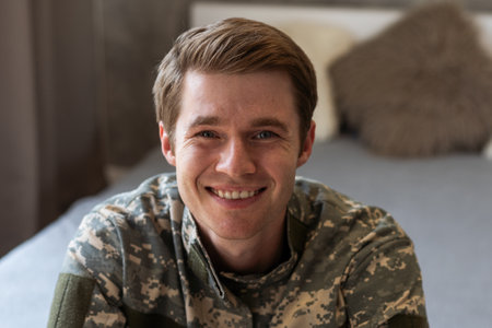 Portrait of a smiling male soldierの写真素材