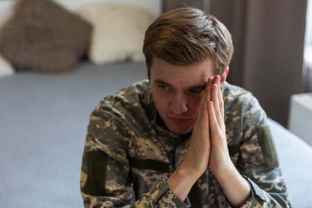 a military man in his thoughtsの写真素材