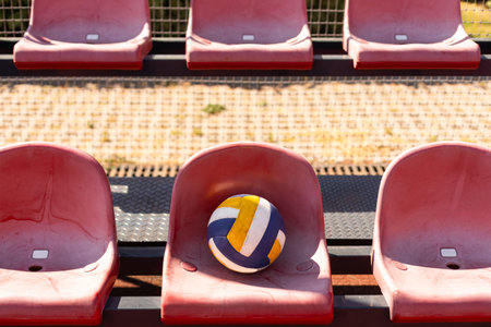 volleyball ball with blurred arena in background.の写真素材