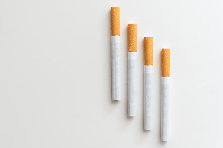 stairway of cigarettes isolated on a white backgroundの写真素材