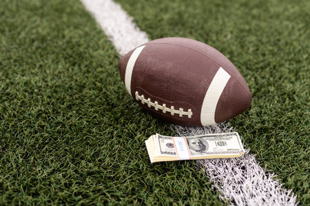 American football on the field in a stadium