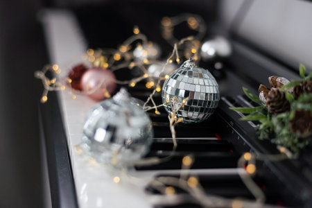 Synthesizer with Christmas decor toys. Christmas music.