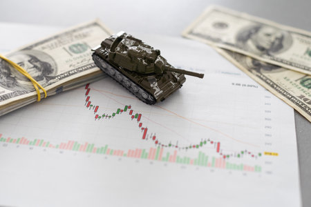tank against the background of dollars. Concept of war.の写真素材