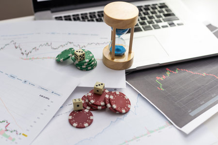 Stockholm, Sweden. 10-10-2022. Double dice on the stock market paper or newspaper. Concept of skill...