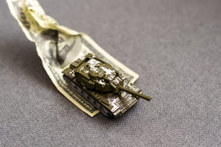 Financial crisis, crumpled one dollar banknote, US dollars on the white table. Bank image and commercial photo background.の写真素材