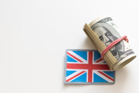 Flag of Great Britain and dollar billsの写真素材