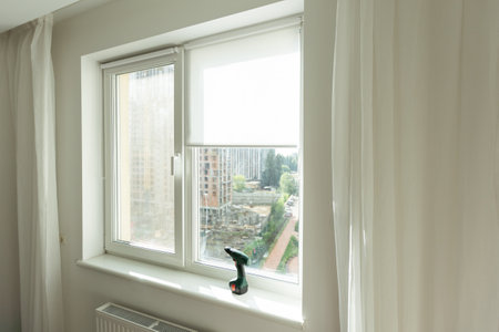 Plastic window of the three wings. A window in an empty room.の写真素材