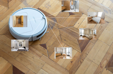 people, housework and technology concept. robot vacuum cleaner.の写真素材