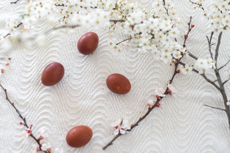 Traditional Easter cakes and colored eggs. A branch tree