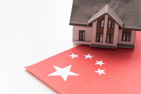 Small house on a flag - Living or migrating to China