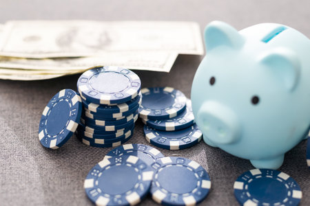 Blue poker chips on stock market chart backgroundの写真素材