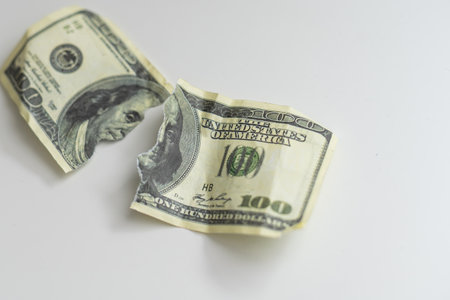 Dollars bill torn as background.の写真素材