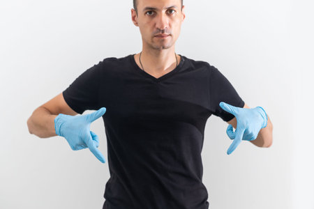 a man in protective sterile glove on hand
