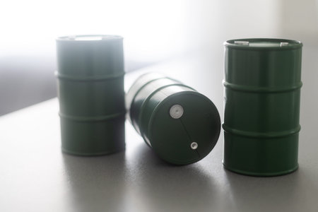 models of barrels with oil on the table