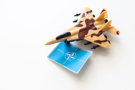 Model grey miniature fighter jet created on a 3d printer, on white background. transportation...