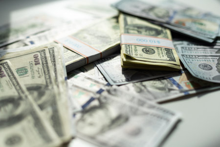 Big pile of US money lying down in random order closeupの写真素材