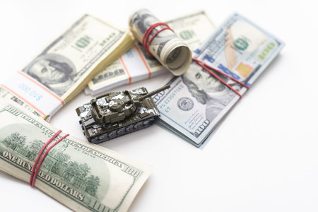 a toy tank, dollars, business