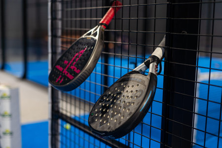 Kyiv, Ukraine. March 22, 2024, Paddle tennis rackets on the court