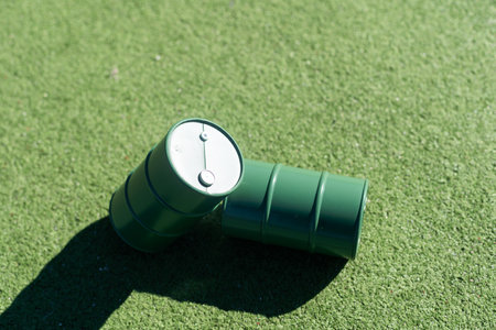 toy oil barrel on a natural backgroundの写真素材