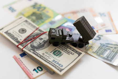 a toy military machine air defense and moneyの写真素材